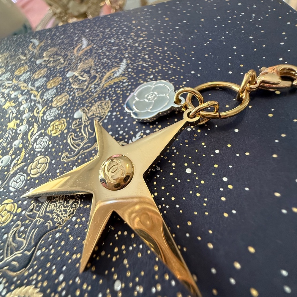 Chanel 2025 Christmas Gold Comet and Camellia Charm